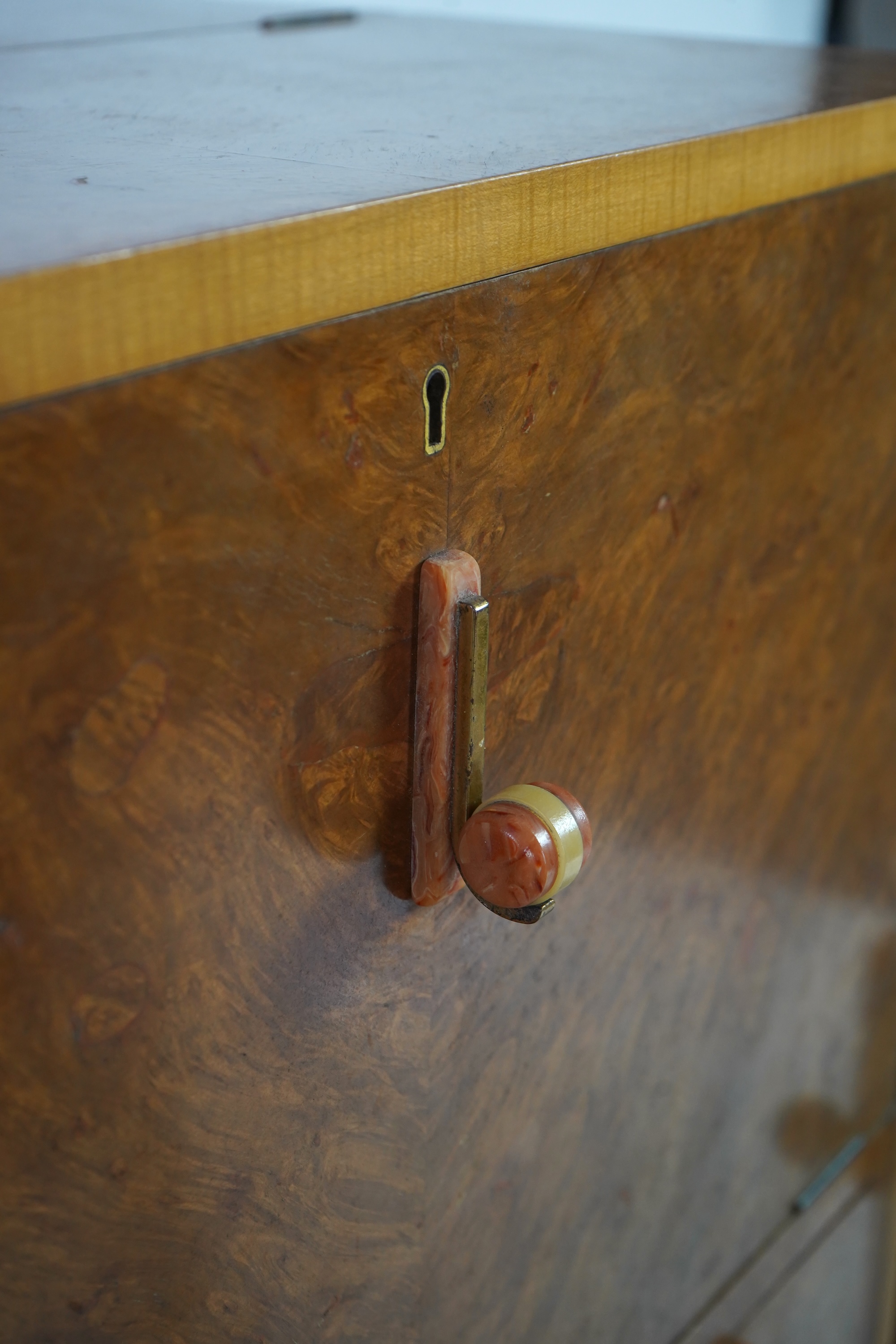Attributed to Harry and Lou Epstein: An Art Deco burr walnut dining suite